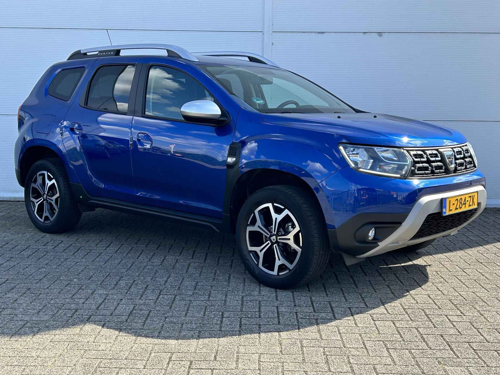 Dacia Duster 1.0 TCe Bi-Fuel Prestige / LPG G3 / Trekhaak (1500 KG) / Navigatie + Apple Carplay/Android Auto / Achteruitrijcamera / Climate Control / Cruise Control / - 17/37