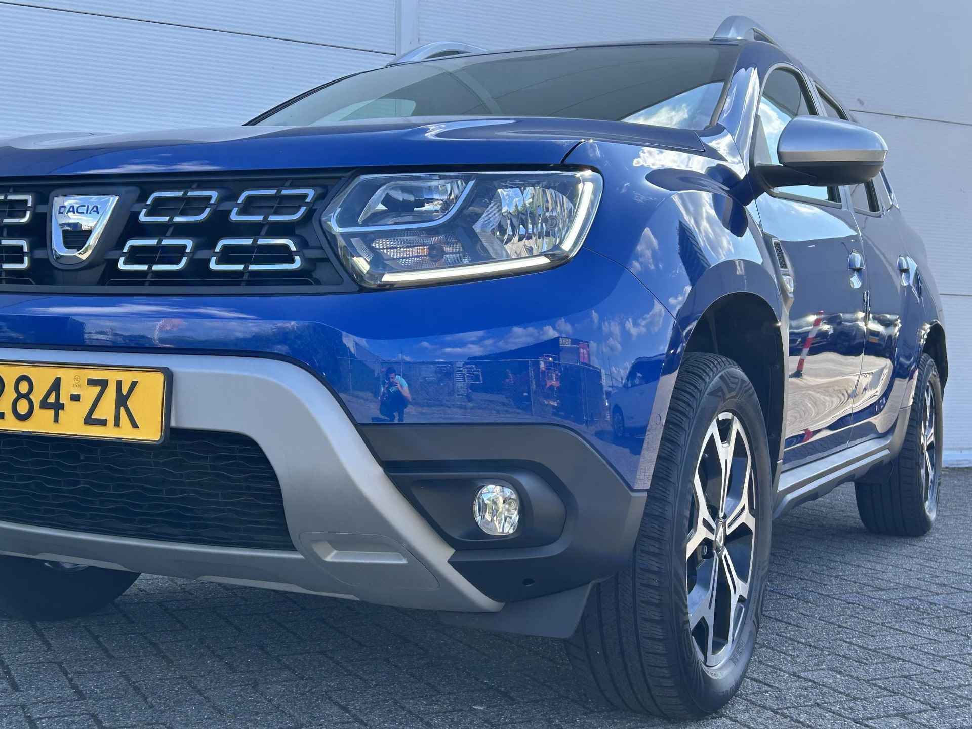 Dacia Duster 1.0 TCe Bi-Fuel Prestige / LPG G3 / Trekhaak (1500 KG) / Navigatie + Apple Carplay/Android Auto / Achteruitrijcamera / Climate Control / Cruise Control / - 23/37