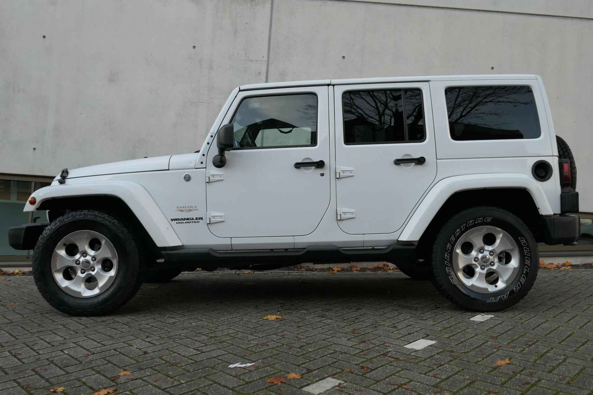 Jeep Wrangler Unlimited 3.6 Sahara Facelift 284pk NAP Leder Cruise PDC Stoelverwarming - 18/25