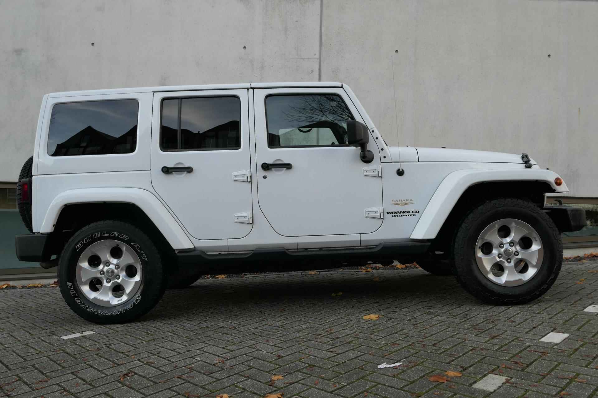 Jeep Wrangler Unlimited 3.6 Sahara Facelift 284pk NAP Leder Cruise PDC Stoelverwarming - 19/25