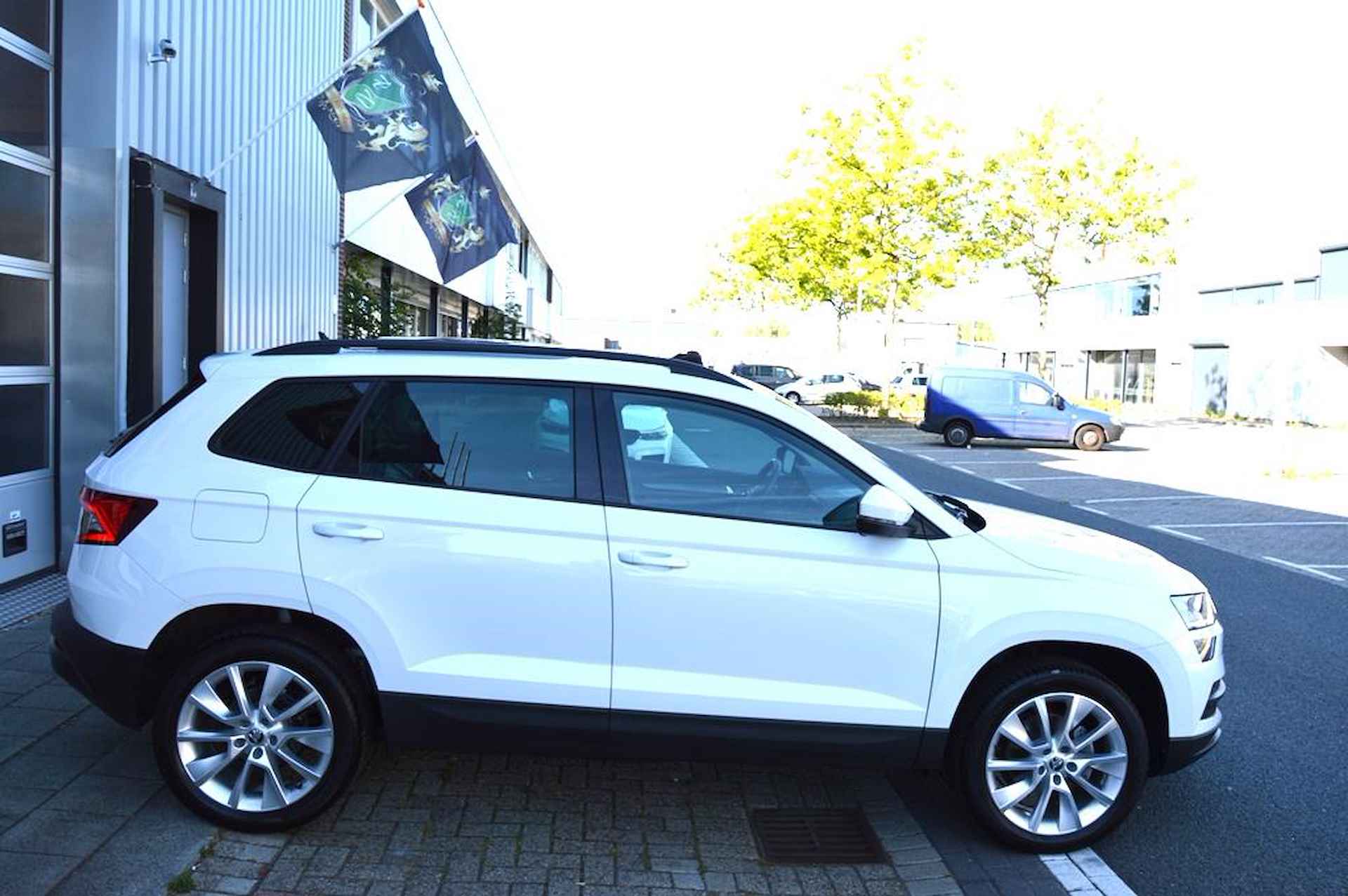 Skoda KAROQ 1.5 TSI ACT Style AUT CAM/LMV-18/LEER/NAVI/PANO - 14/68