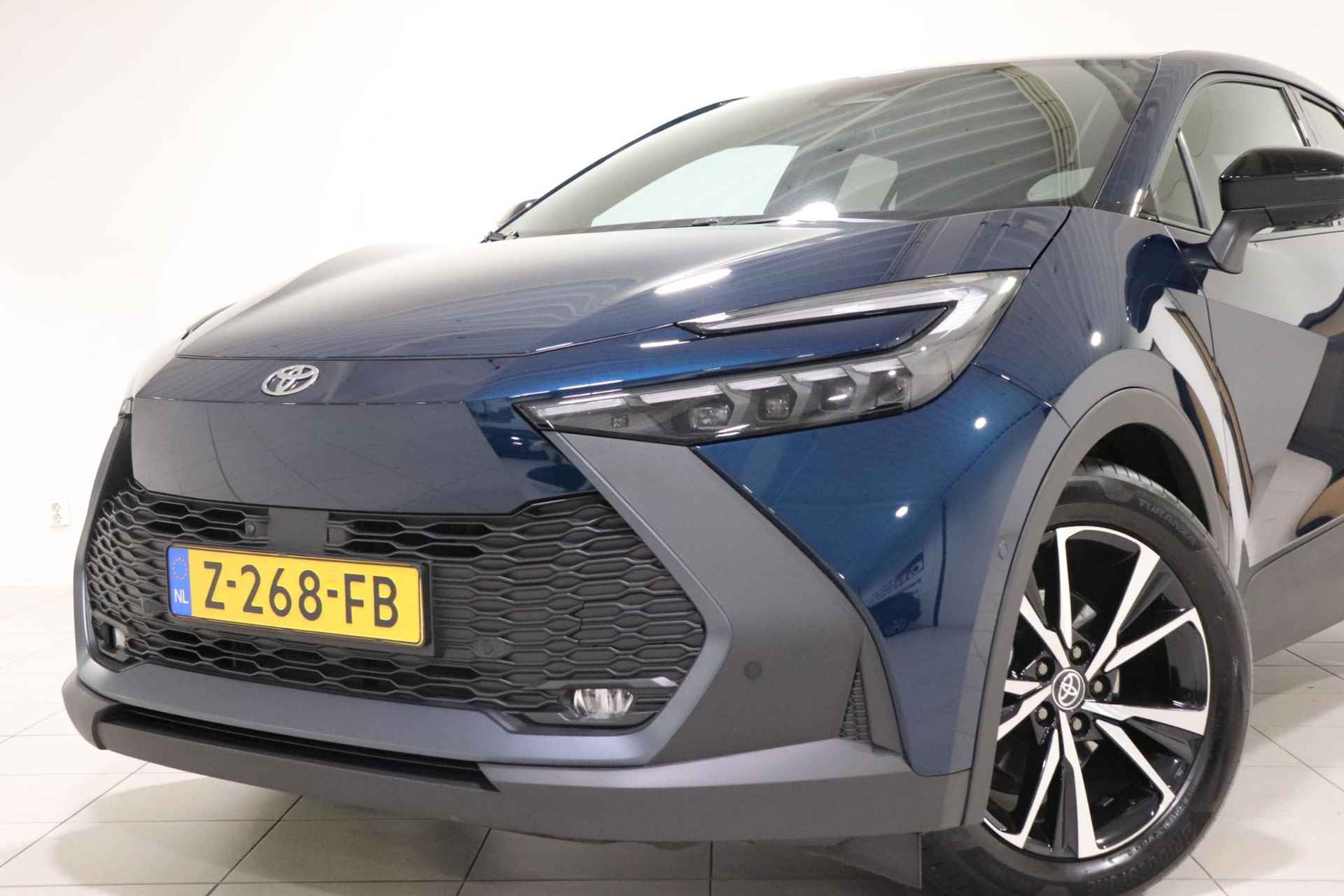 Toyota C-HR 1.8 Hybrid 140 First Edition BSM, Apple Carplay/Android Auto, Parkeersensoren voor en achter, Parkeerhulpcamera achter, Cruise & Climate control, NAVI! - 14/32