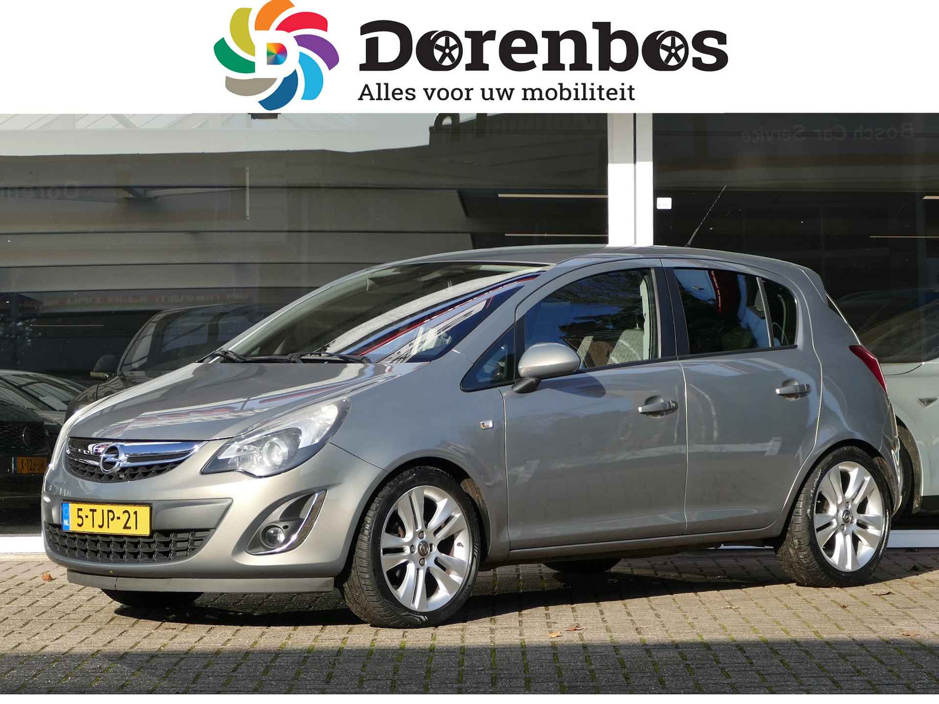 Opel Corsa 1.4-16V Cosmo | trekhaak | all-season-banden | parkeersensoren - 1/43