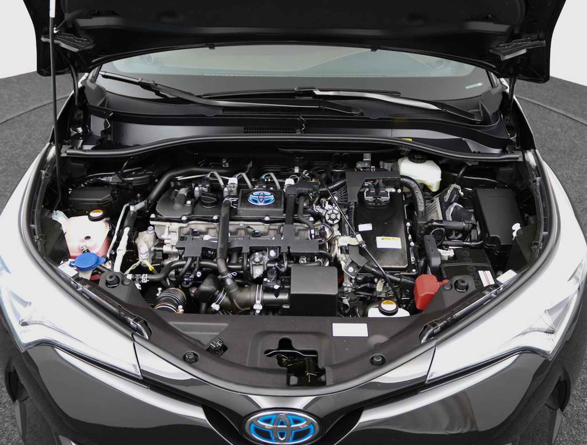 Toyota C-HR 1.8 Hybrid Premium | Full map navigatie | Camera | 1/2 lederen bekleding | All season banden | - 34/51