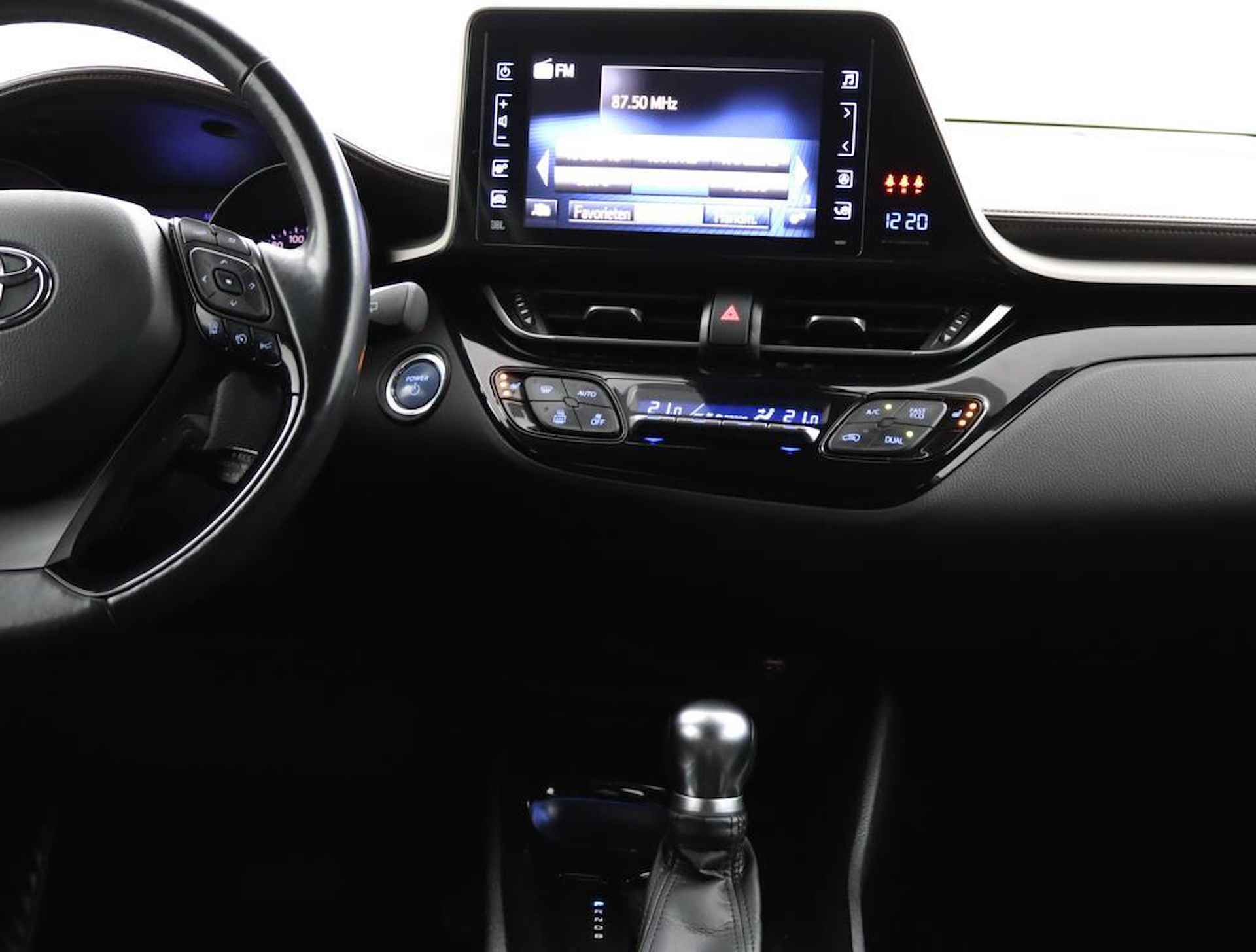 Toyota C-HR 1.8 Hybrid Premium | Full map navigatie | Camera | 1/2 lederen bekleding | All season banden | - 48/51