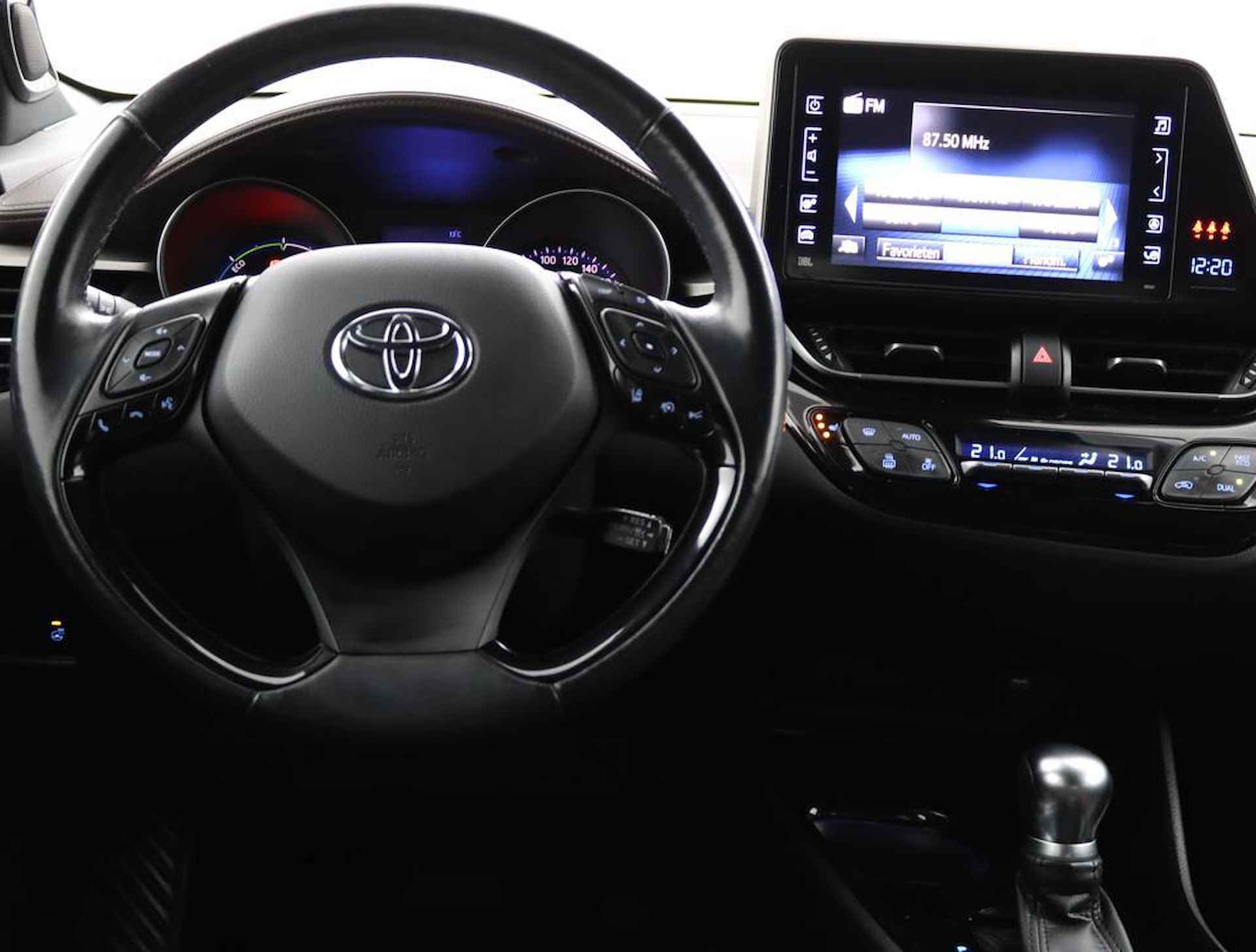 Toyota C-HR 1.8 Hybrid Premium | Full map navigatie | Camera | 1/2 lederen bekleding | All season banden | - 49/51