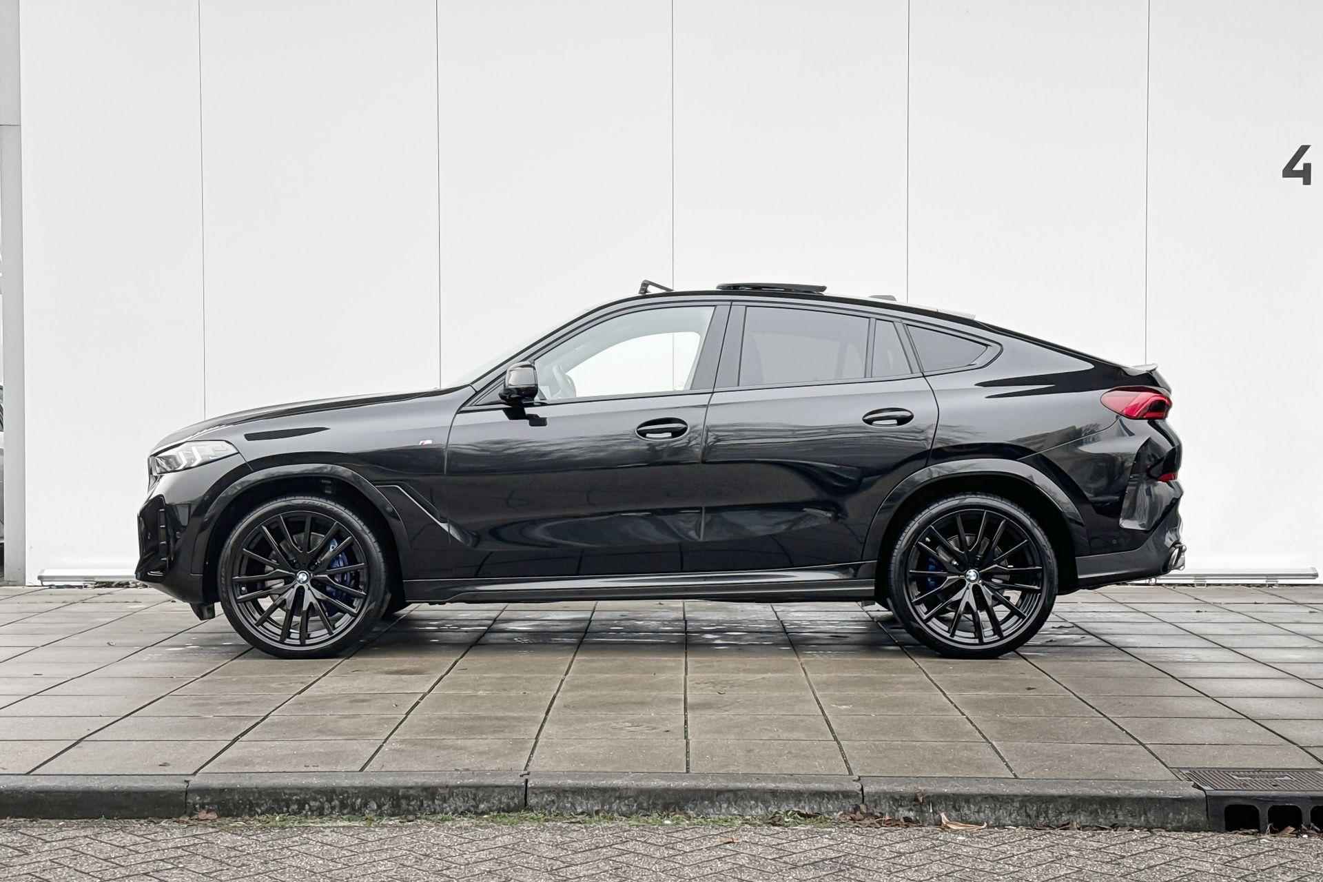 BMW X6 xDrive40i M -Sport Pro Skylounge / Stoelverwarming Voor & Achter / Stuurwielrand Verwarming / Integrale Actieve Besturing / Harman Kardon / Electrische Zwenkhaak / 22 Inch / Driving Assistant Prof / Parking Assistant Prof / Getinte Ramen Achter - 2/31