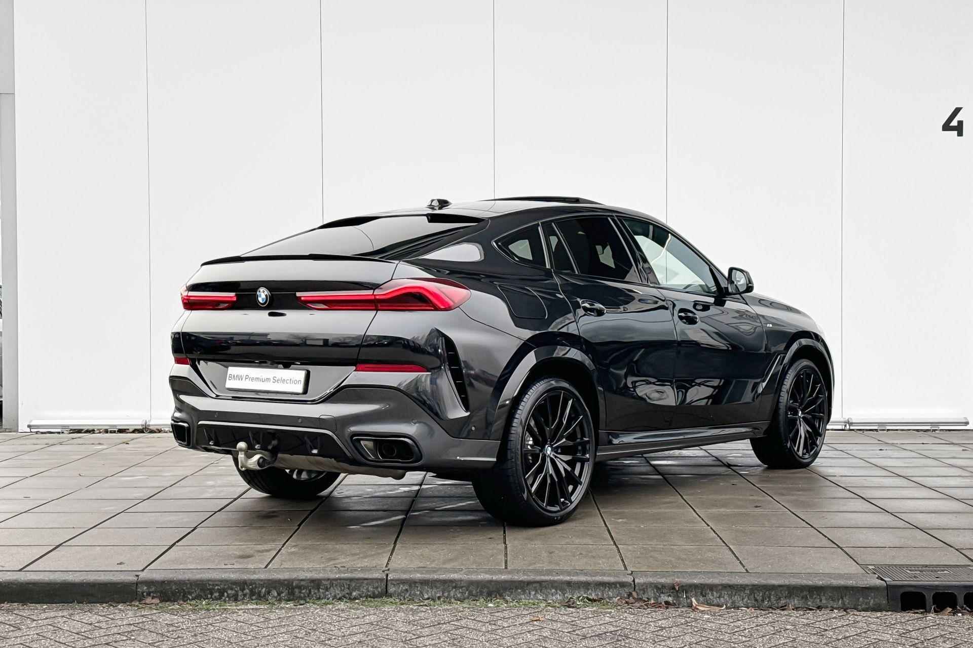 BMW X6 xDrive40i M -Sport Pro Skylounge / Stoelverwarming Voor & Achter / Stuurwielrand Verwarming / Integrale Actieve Besturing / Harman Kardon / Electrische Zwenkhaak / 22 Inch / Driving Assistant Prof / Parking Assistant Prof / Getinte Ramen Achter - 4/31