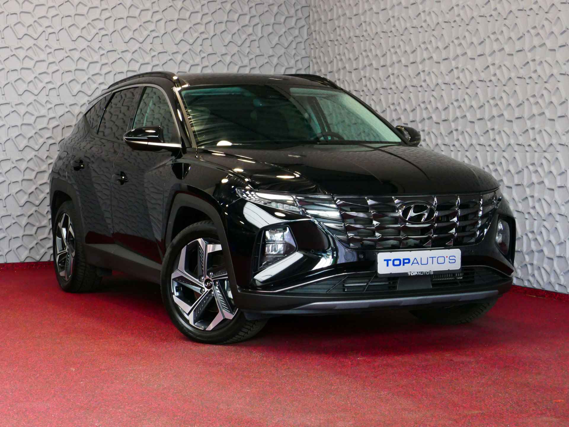 Hyundai Tucson 1.6 T-GDI PHEV 265PK 4WD SCHUIFDAK LED STUUR/STOEL VERW. NAVI ELEK.KLEP PHEV PLUG IN HYBRID - 55/77