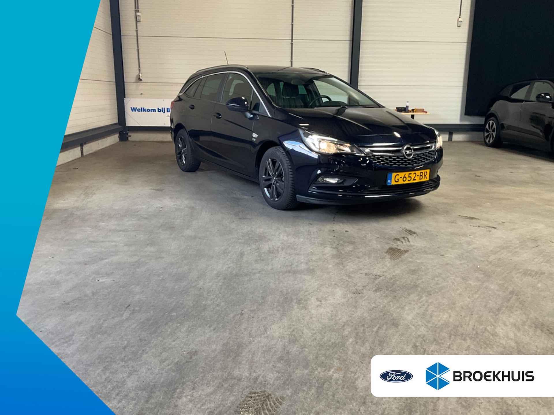 Opel Astra Sports Tourer 1.4 120 Jaar | Automaat | Clima | Trekhaak | Parkeersensoren - 1/2