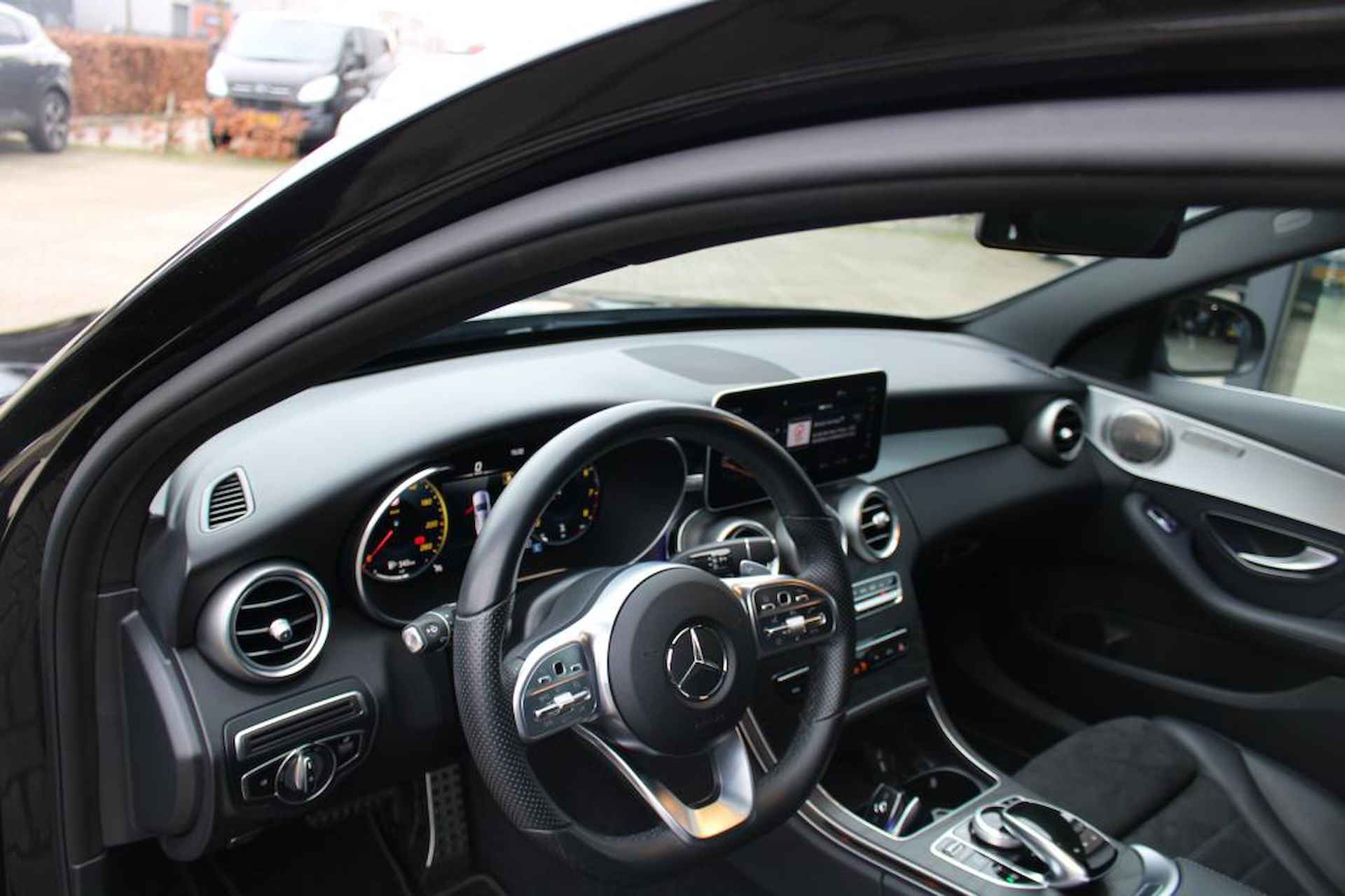 Mercedes-Benz C-klasse Estate 180 Business Solution AMG PANO/Camera/12 maanden bovag - 10/14