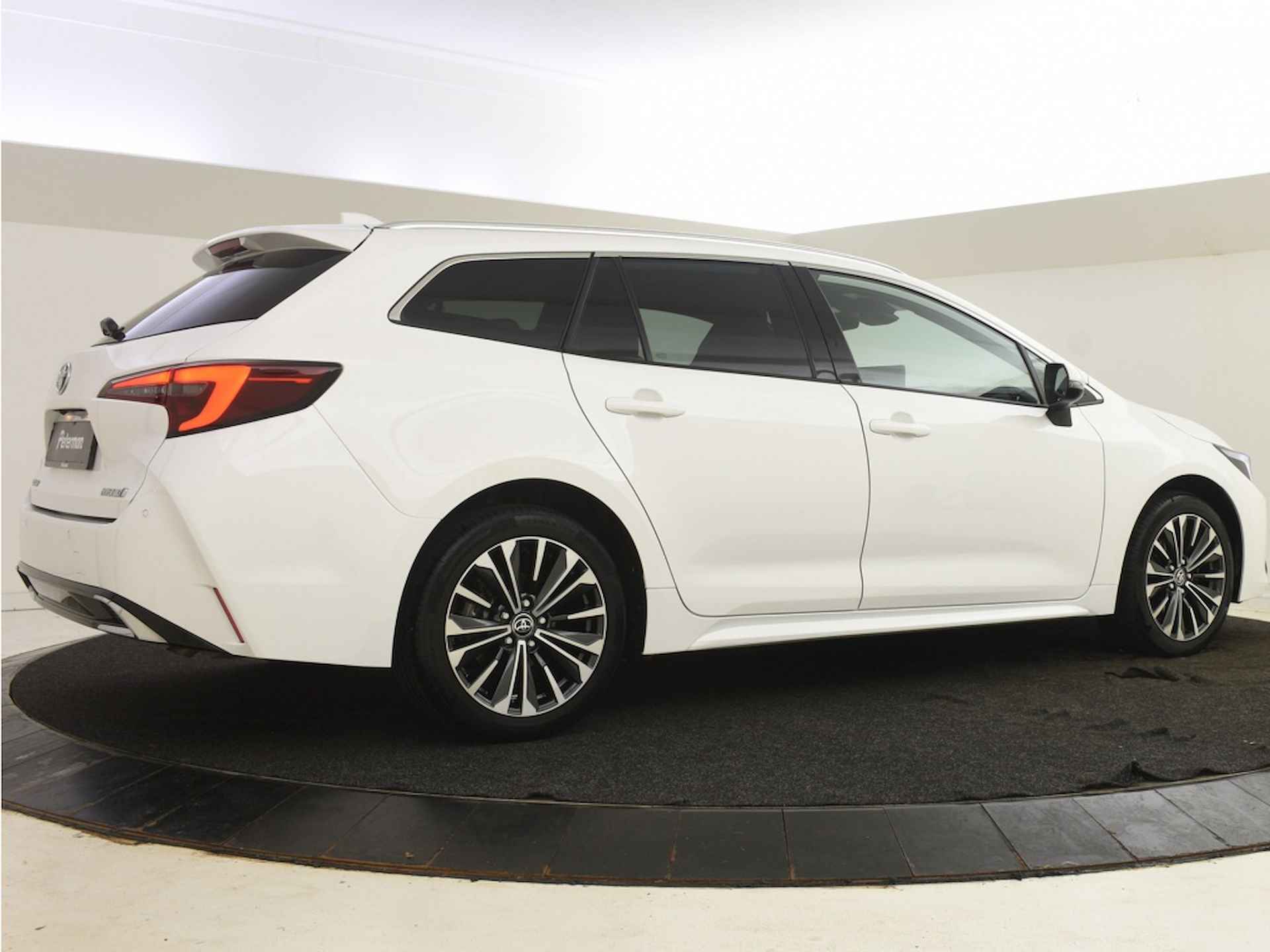 Toyota Corolla Touring Sports 1.8 Hybrid Style Edition | PDC V+A | Stuur en Stoelverwarming - 7/27