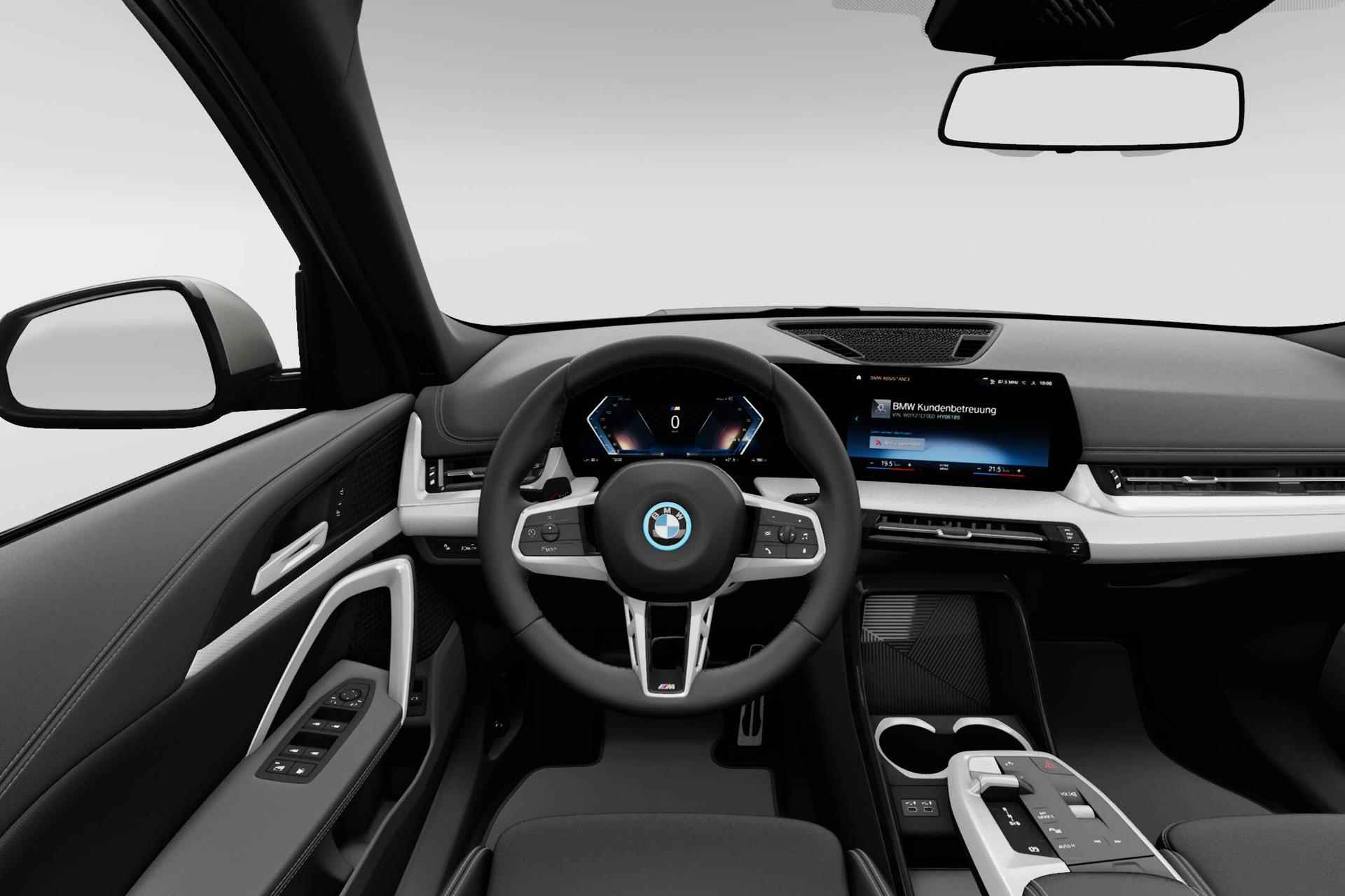 BMW iX1 xDrive30 67 kWh | Glazen panoramadak | Sportstoelen voor - 12/20