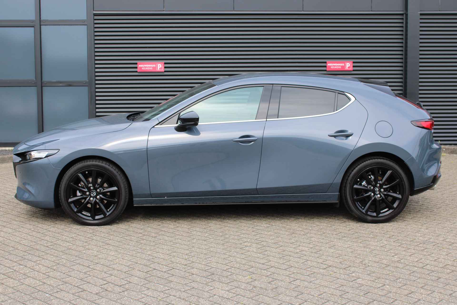 Mazda 3 2.0 e-SkyActiv-G M Hybrid 150 Homura / Camera / Navigatie / Stoelverwarming / Dodehoek Detectie / Keyless / Head-up display / "Vraag een vrijblijvende offerte aan!" - 3/37