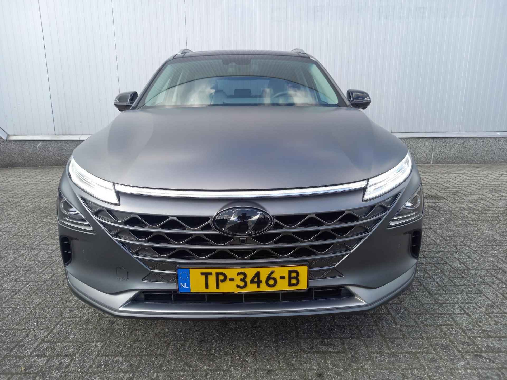 Hyundai NEXO FCEV Plus Pack Waterstof / Schuif/kanteldak / Stoelverwarming en ventilatie / Vol lederen bekleding / 100% Dealer onderhouden / Getinte ramen / - 69/75