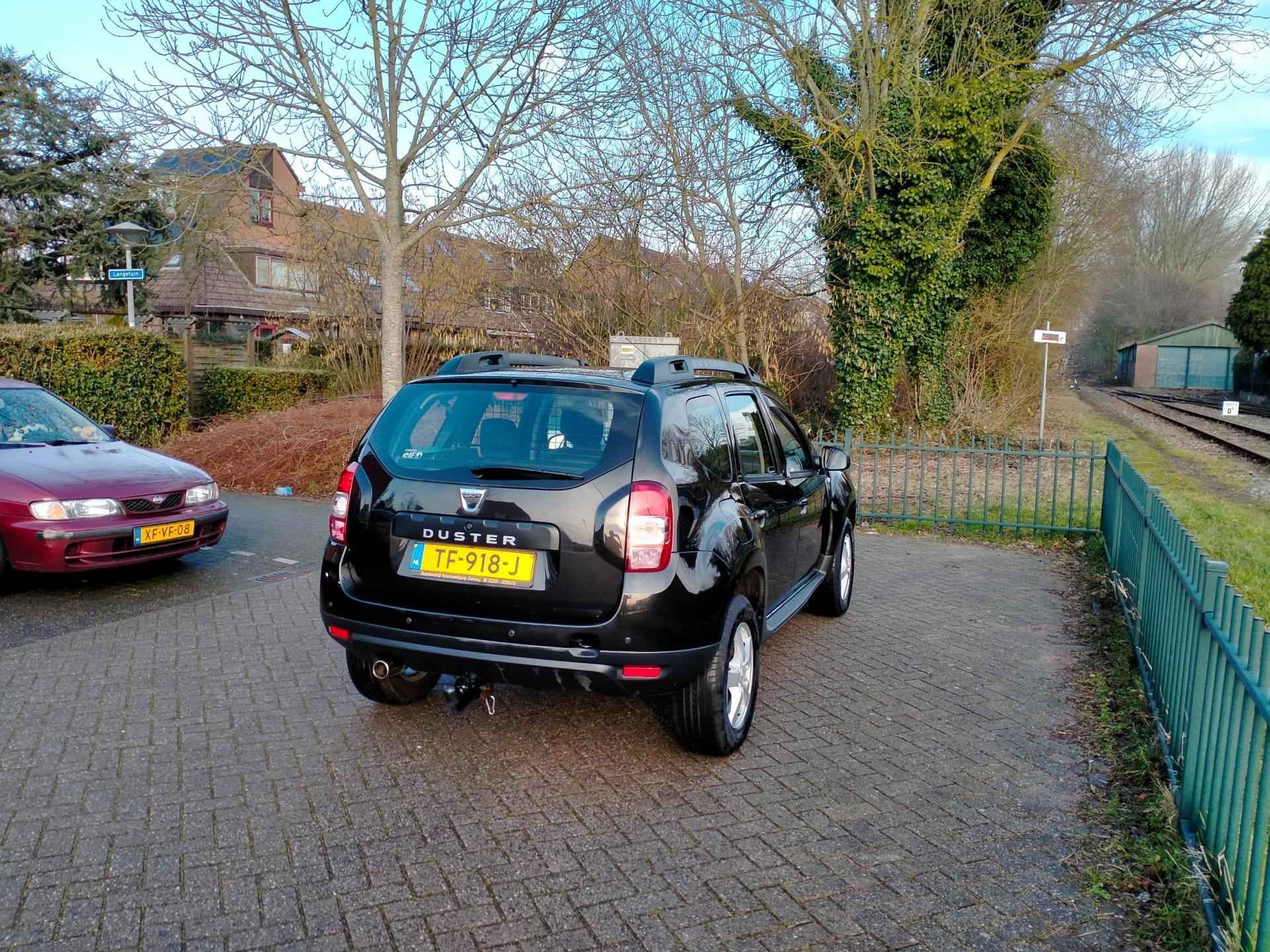 Dacia Duster 1.6 Lauréate 2wd Airco/Navi/trekhaak RIJKLAAR - 8/29