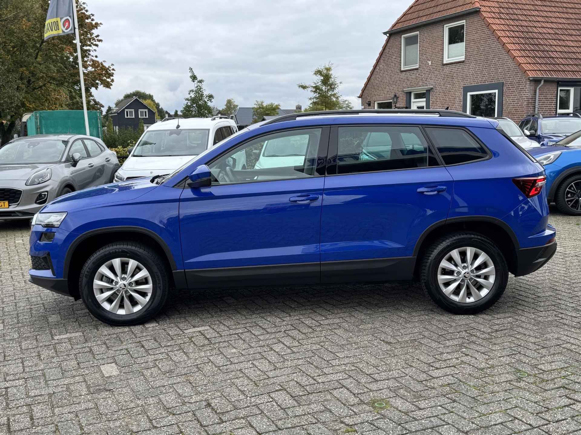 Skoda Karoq 1.5 TSI ACT Business Edition PANO | NAVI | CAMERA | TREKHAAK | BOVAG! - 4/34